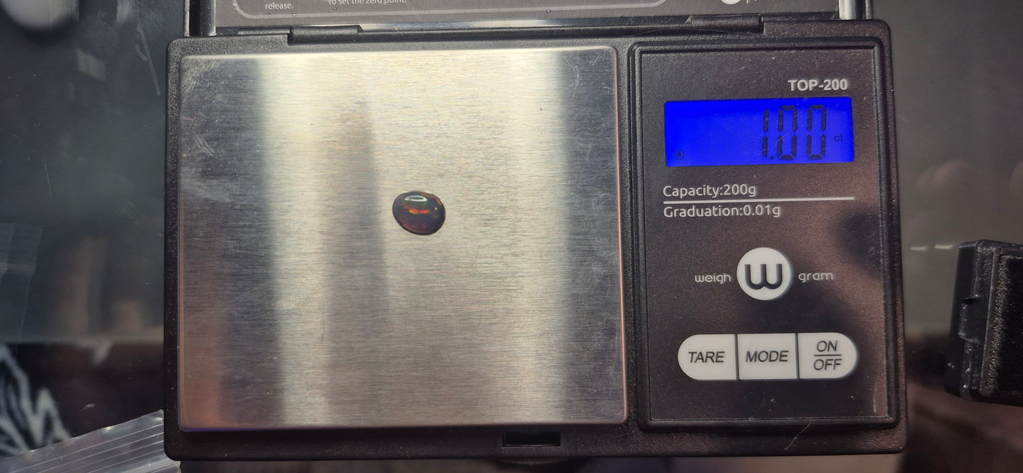 1.00ct Smoked Ethiopian Welo Opal – Oval Cabochon Fiery Red & Green Flash