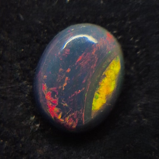 1.00ct Smoked Ethiopian Welo Opal – Oval Cabochon Fiery Red & Green Flash