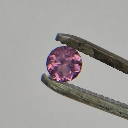 Vibrant Modified Round Brilliant Rhodolite Garnet - 0.65 ct